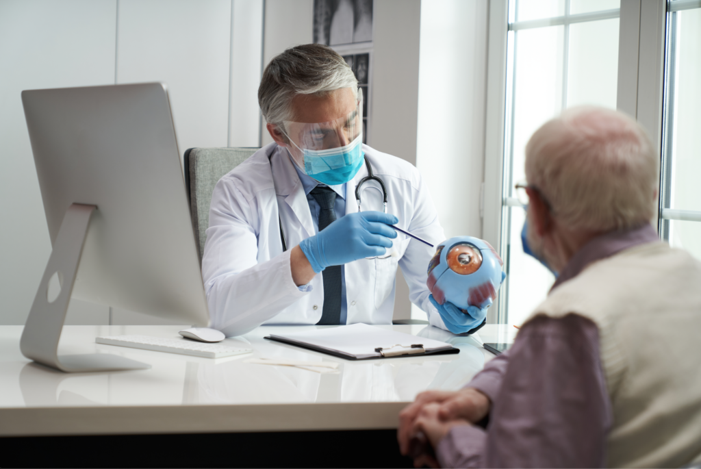 Doctor explaining eye anatomy to a patient