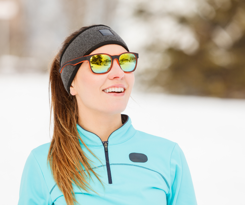 Active woman outside wearing sunglasses