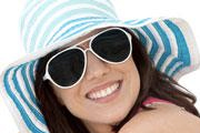 Happy woman wearing stylish sunglasses
